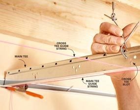 The rail and anchor system allows you to slightly level your ceiling if needed. Drop Ceiling Tiles Installation Tips Diy Family Handyman