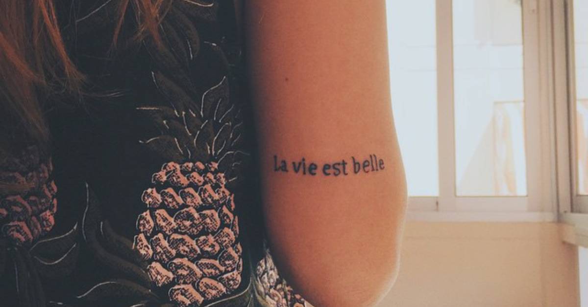 In fact, this is the only tattoo i've ever seen that i've liked (excepting my dad's faded anchor tattoo. Little tricep tattoo saying "La vie est belle", french