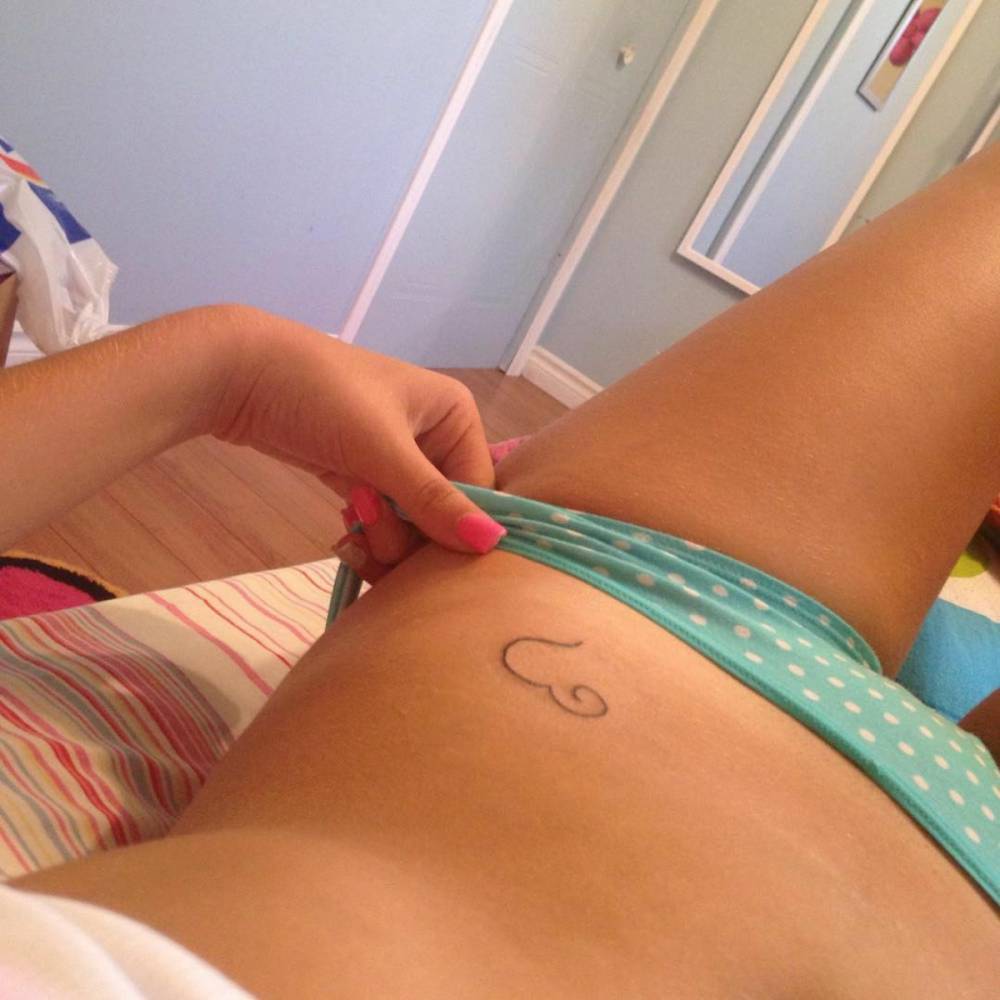 Hip Tattoo Of A Heart Shaped As A Letter E For Emy