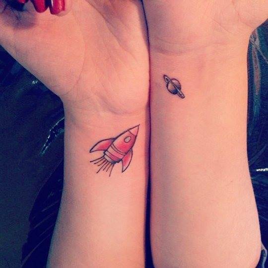 Wrist Tattoos Of A Rocket And Planet Saturn On Aylén. 540_x_540_jpg