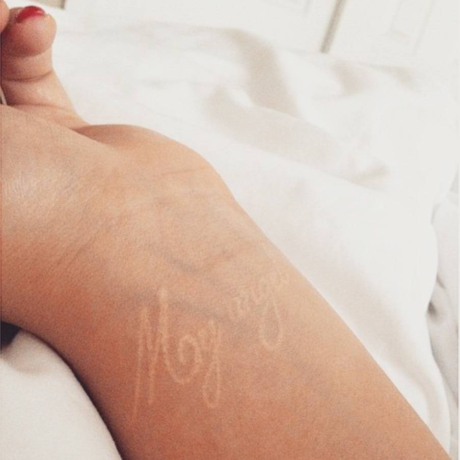 White Ink Tattoo Saying My Angel On Samantha S