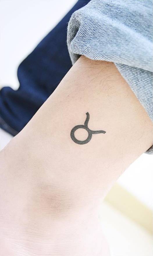 Minimalist Taurus Zodiac Symbol Tattoo On The Ankle. 878_x_526_jpg