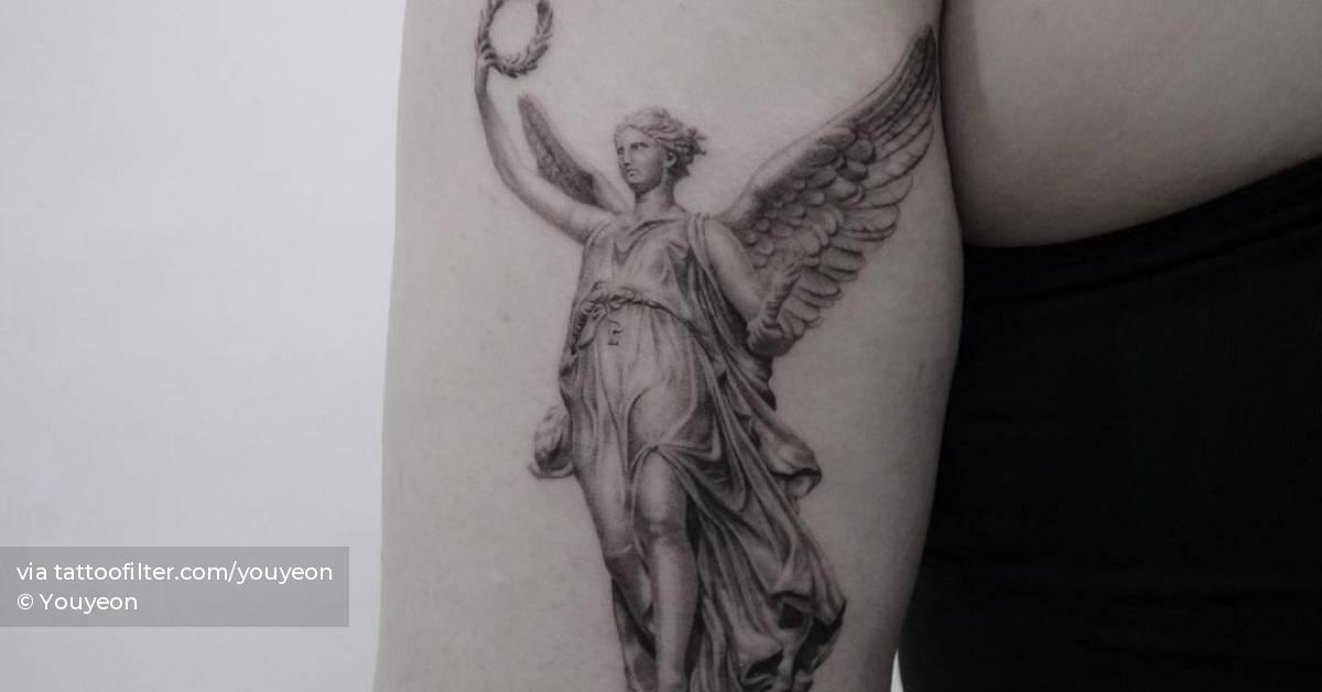 Micro-Realistic Nike Goddess Tattoo On The Tricep. 628_x_1200_jpg