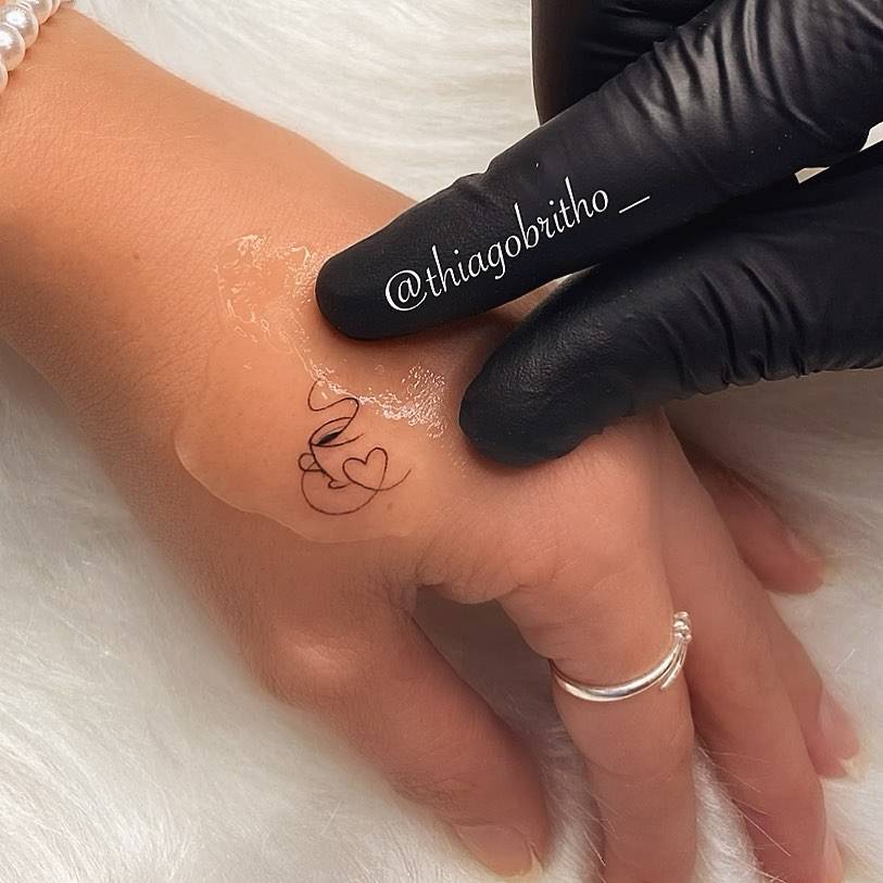 Minimalist Coffee Cup Tattoo On The Hand. 813_x_813_jpg