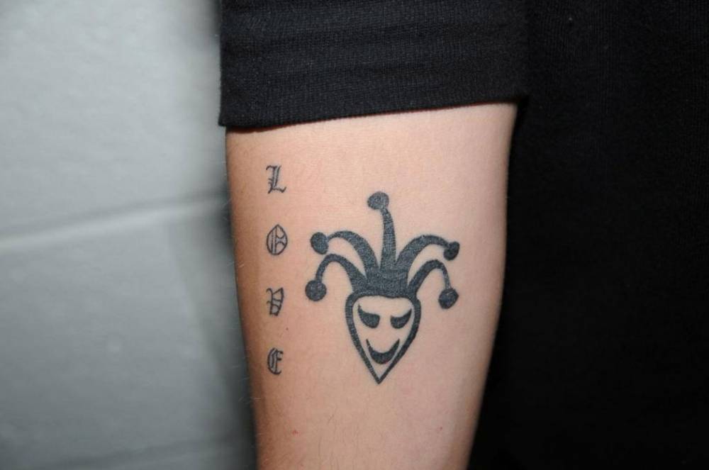 Justin's Right Forearm Tattoo Saying "Love" On A Gothic 663_x_1000_jpg