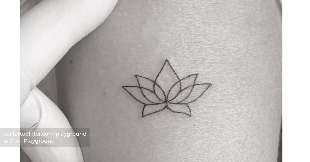 Minimalist Lotus Flower Tattoo On The Upper Arm. 628_x_1200_jpg