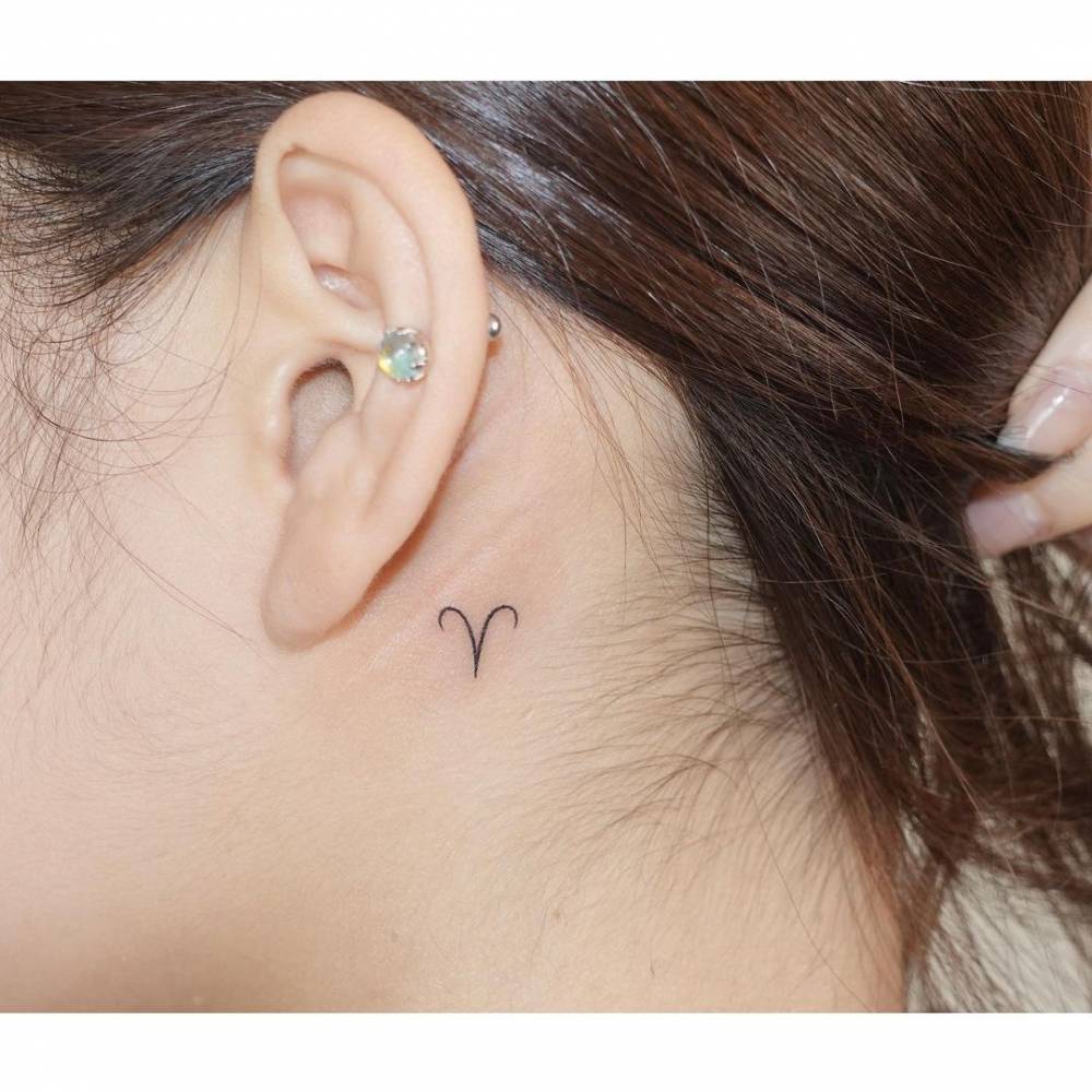 Minimalist Aries Zodiac Symbol Tattoo Behind The Ear. 1000_x_1000_jpg