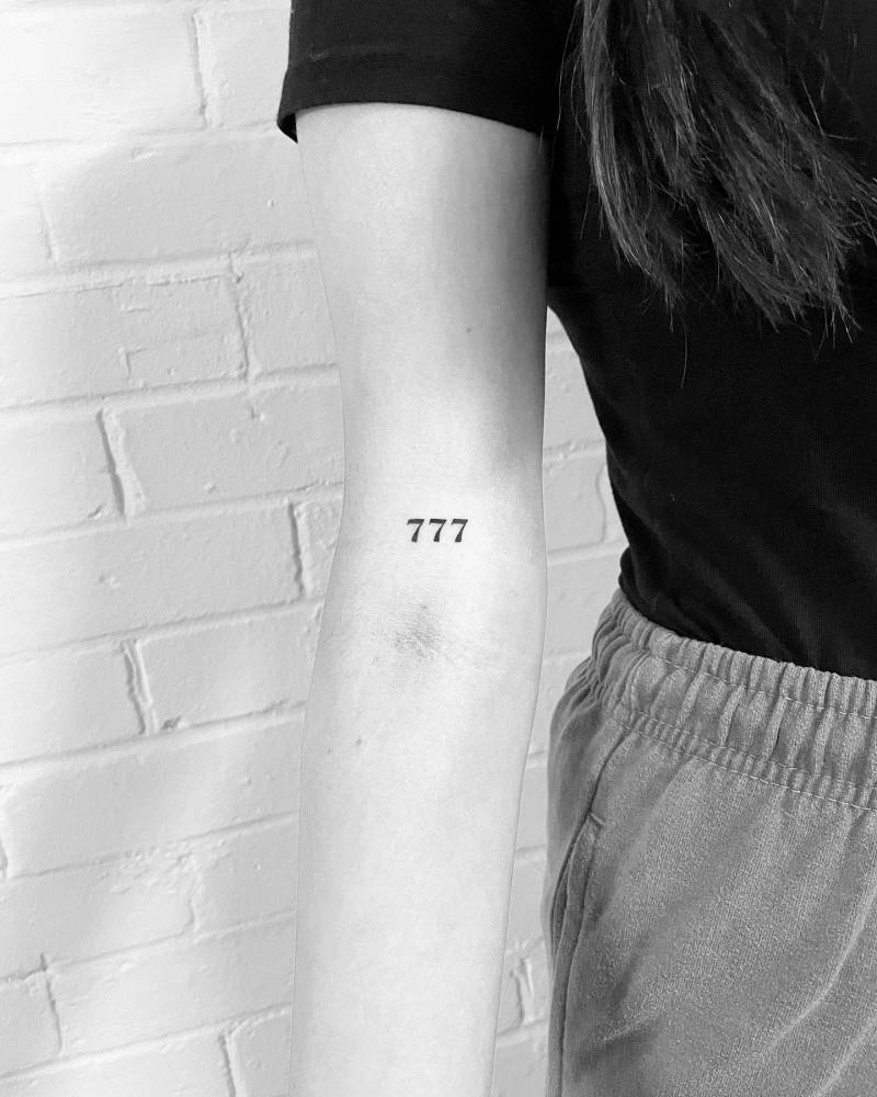 Lucky Number "777" Tattooed On The Bicep. 1000_x_800_jpg
