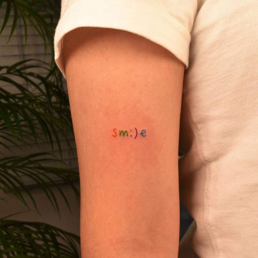 Colorful Tattoo Of The Word "Smile" A Little Smiley 1000_x_1000_jpg