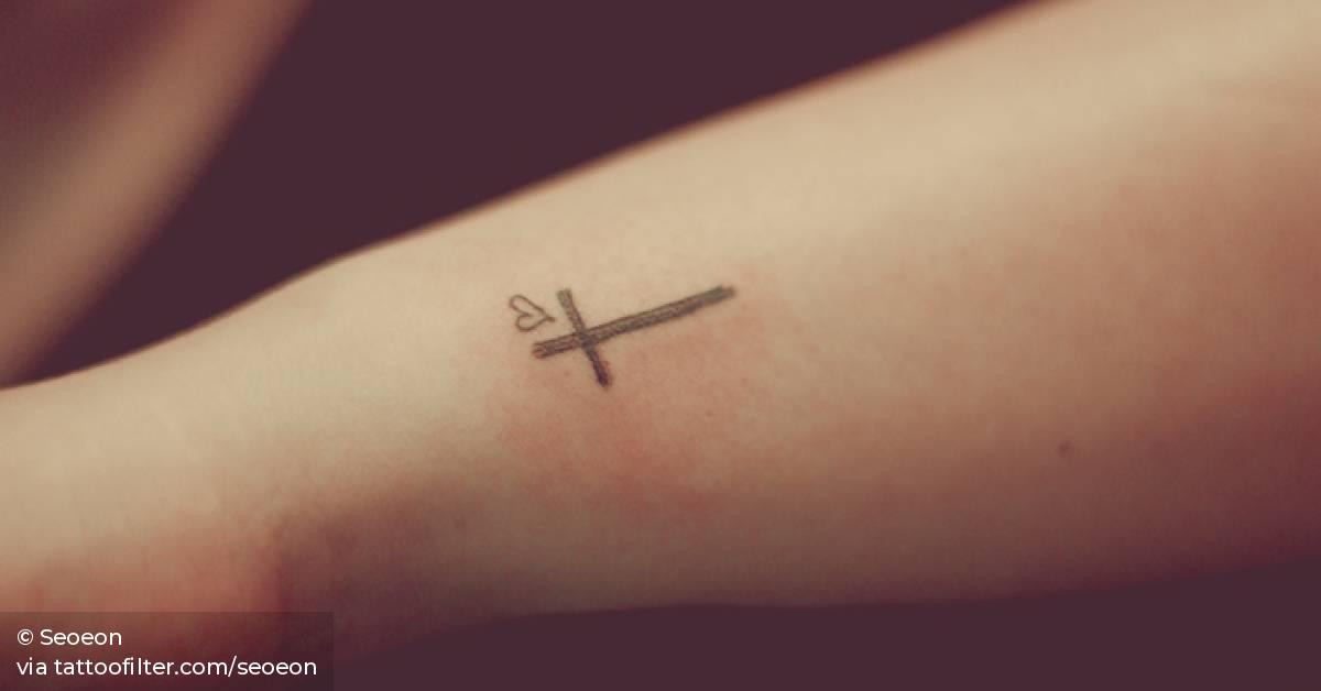 Small Cross And Heart Tattoo On The Left Wrist