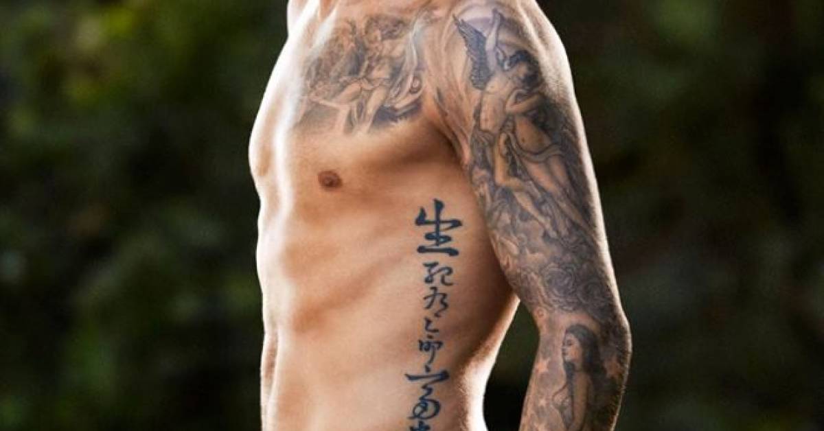 Running Down David Beckham's Left Rib-Cage He Got A 628_x_1200_jpg