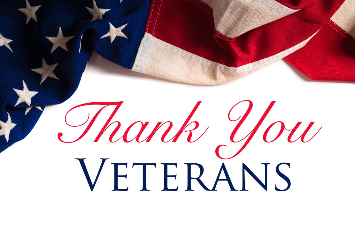 American flag with text, "Thank you Veterans"