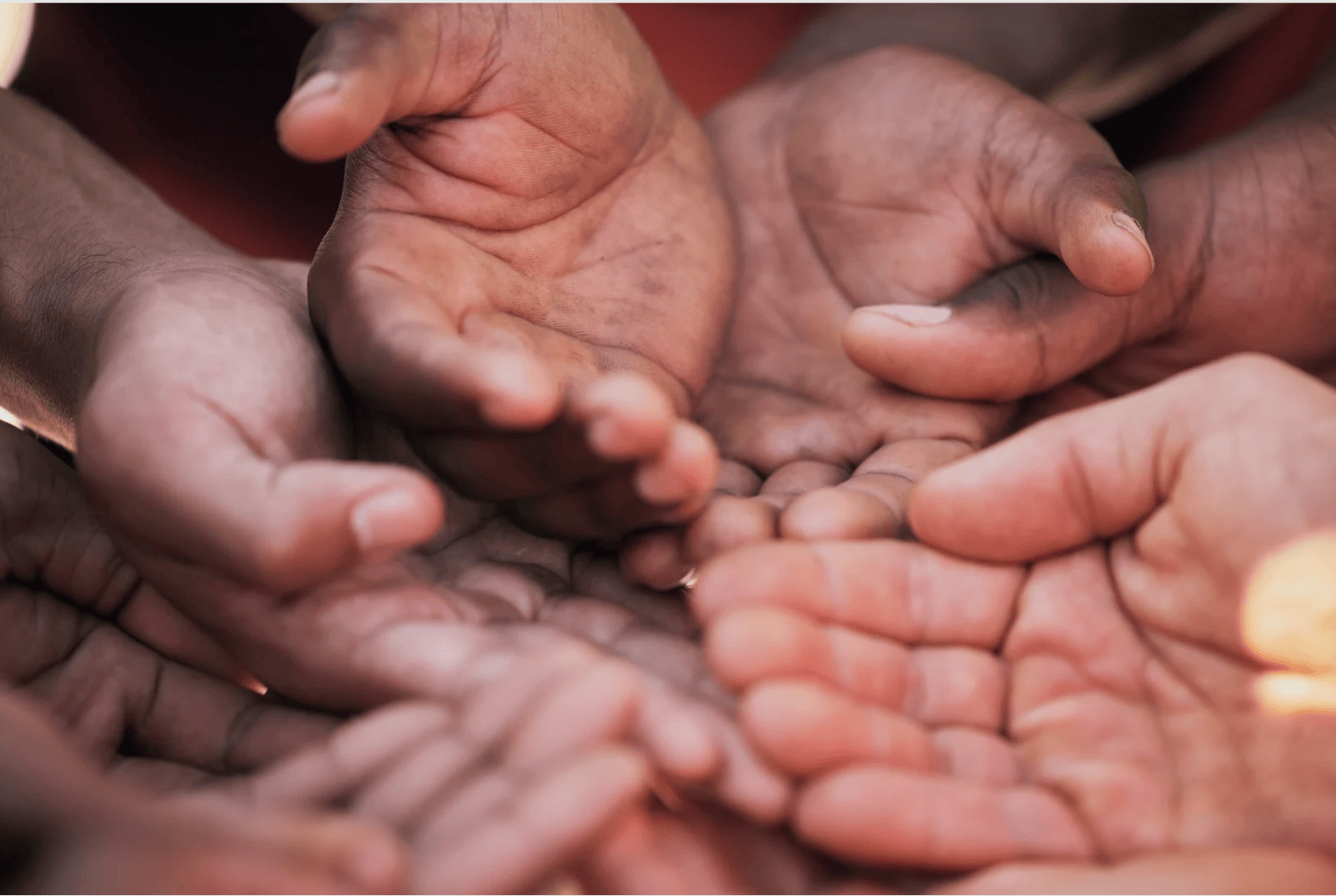 Hands with palms facing up touching