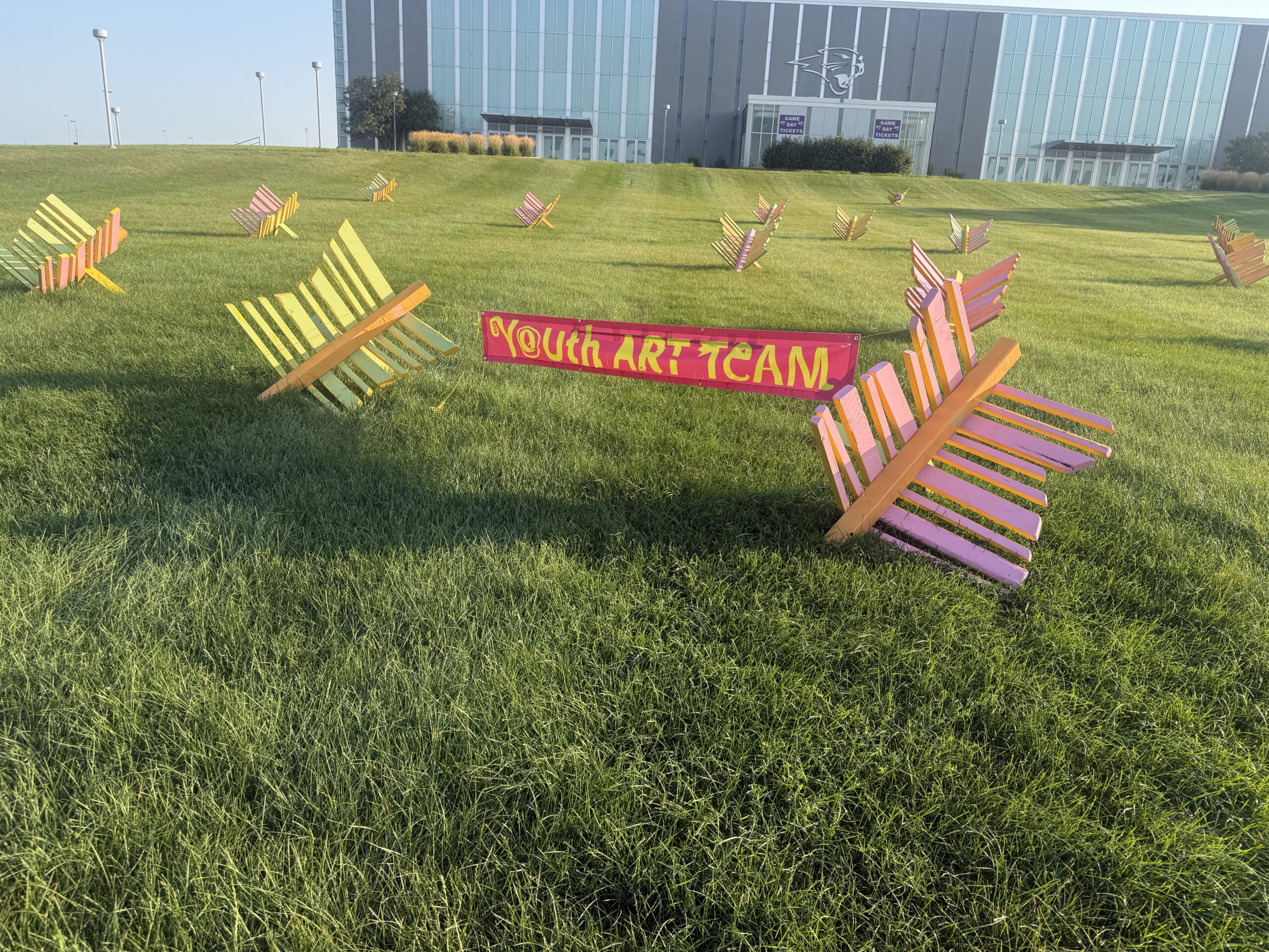 Youth Art Team’s butterfly installation on UNI’s McLeod Center lawn showcases talent of young artists