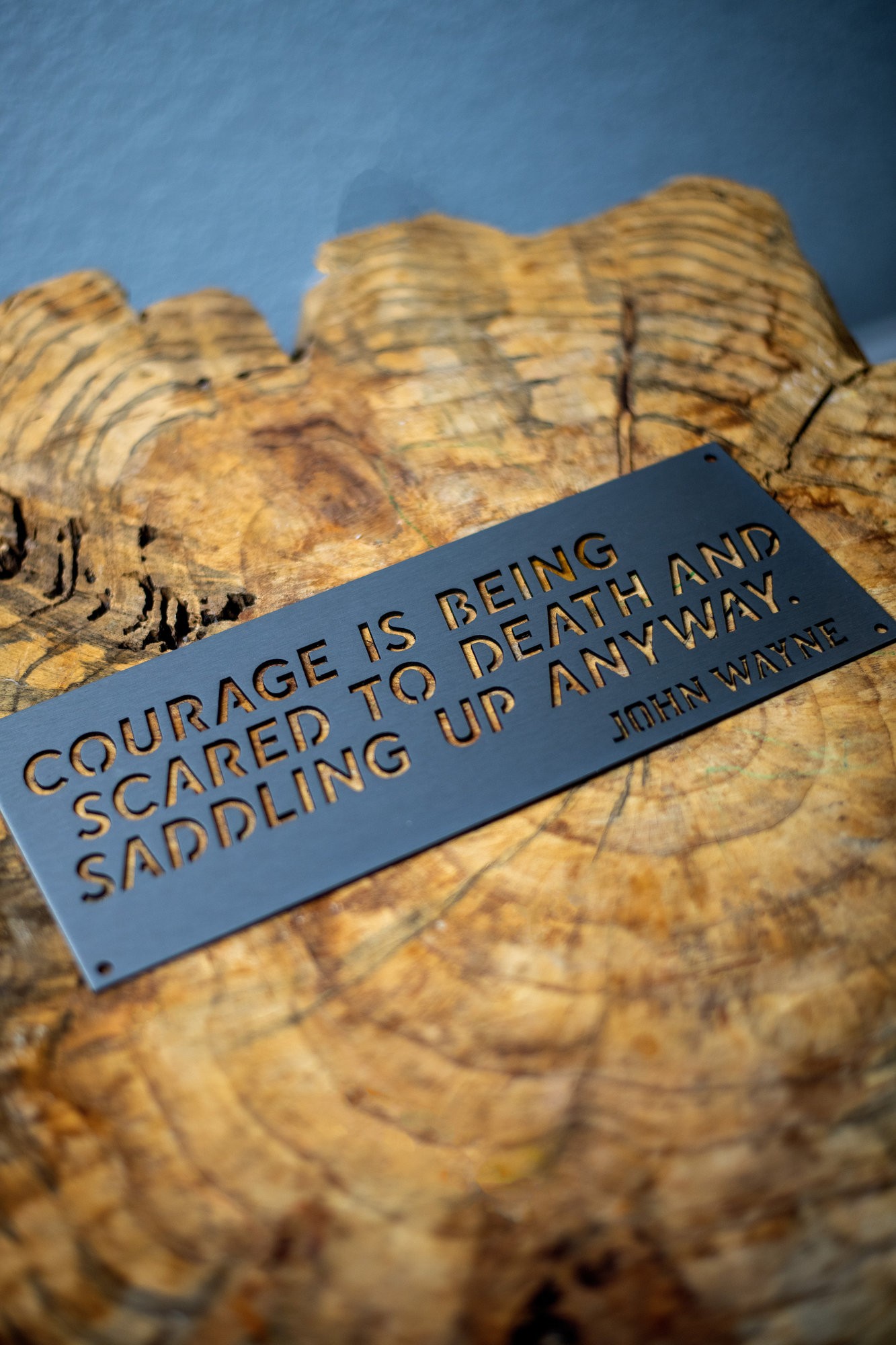 John Wayne "Courage Is Being Scared to Death, but Saddling Up Anyway" Metal Wall Sign