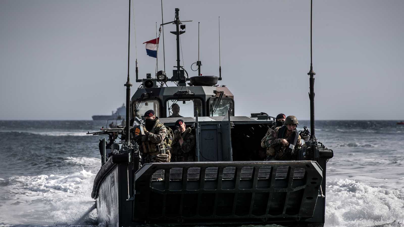 Exercise Dynamic Mariner tests NATO’s Response Force Maritime Component (NRF/M) and interoperability with NATO forces, enhancing flexibility and improving the ability to work together among Allied nations. It runs between 28 September and 8 October 2020.
The exercise brings together 31 surface ships, 1 submarine, 3 maritime patrol aircraft and other air assets as well as personnel, from Belgium, France, Greece, Italy, Netherlands, Spain, and the United States.
DYMR20 is led by the NATO Maritime Command and involves Standing NATO Maritime Group Two (SNMG2) and Standing NATO Mine Countermeasures Group Two (SNMCMG2), two of NATO’s Standing Forces on active duty that contribute to the Alliance’s collective defence on a permanent basis.
HNMLS De Witt and HNMLS Rotterdam conduct amphibious exercise in Cassis. LCVP in assault.

DYMR20. October 5th 2020.
Photo Mediacentrum Defensie (MCD) - Maartje Roos