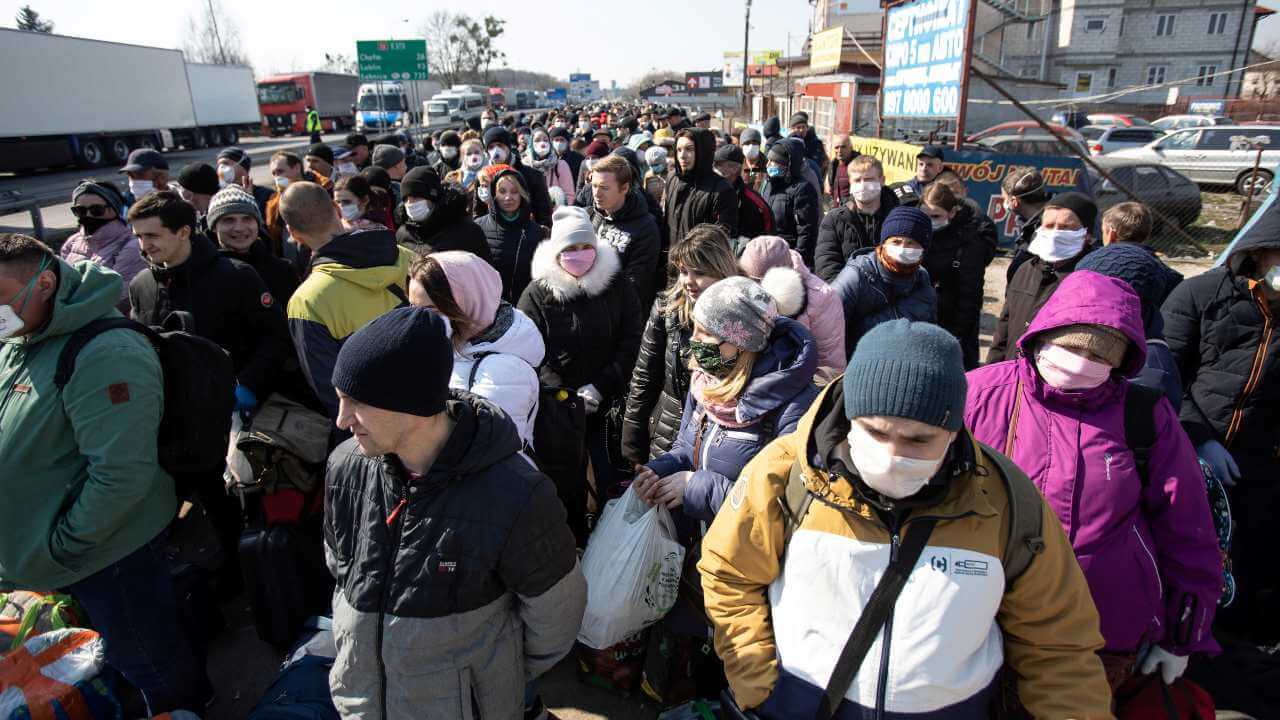 Photo: Trucks queue to cross to Ukraine following planned border closing during the outbreak of coronavirus disease (COVID-19) at the border crossing in Dorohusk, Poland, March 27, 2020. Credit: Jakub Orzechowski/Agencja Gazeta via REUTERS.