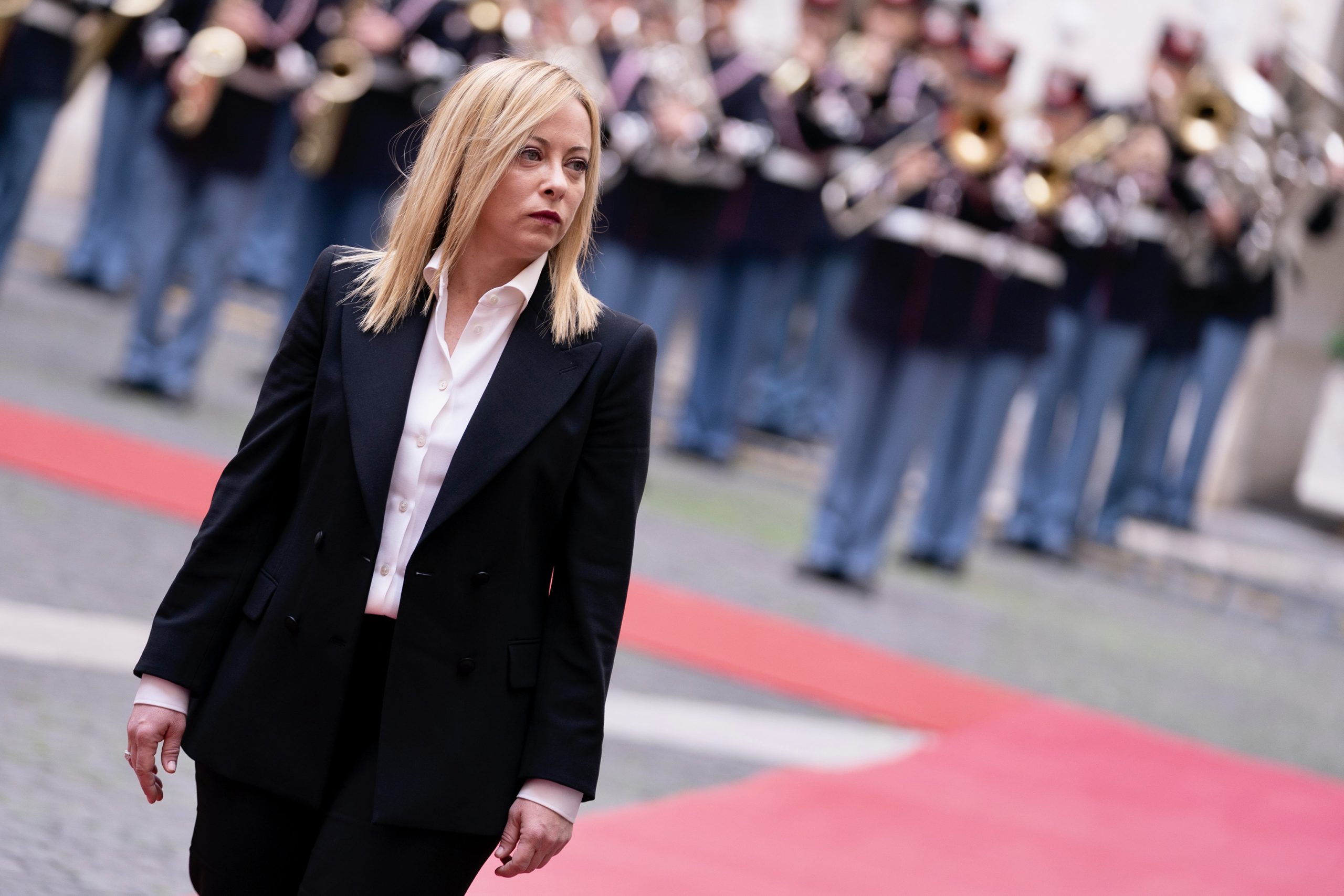 Photo: Rome, 23/10/2022 - After receiving military honours, the President of the Council of Ministers, Giorgia Meloni, reviews the Guard of Honour lined up in the courtyard of Palazzo Chigi. Credit: Italian Government website. https://www.governo.it/en/media/inauguration-ceremony-giorgia-meloni-s-government-palazzo-chigi/20746