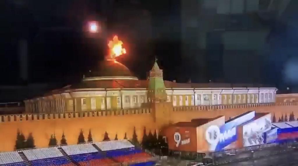Photo: A still image taken from video shows a flying object exploding in an intense burst of light near the dome of the Kremlin Senate building during the alleged Ukrainian drone attack in Moscow, Russia. Credit: @Gerashchenko_en via Twitter. https://twitter.com/Gerashchenko_en/status/1653743906851266560/photo/1
