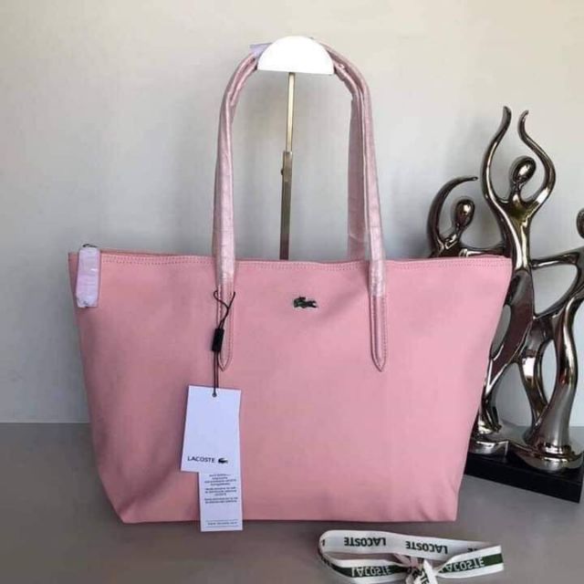 The logo should be printed on the heel on the outer side of the shoes. Original Lacoste Bag Logo Vs Fake Cheaper Than Retail Price Buy Clothing Accessories And Lifestyle Products For Women Men