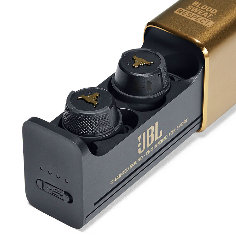 Although the most visible portion of the wireless headphone may be several feet away from the audio receiver, some portion of the headphones must physically connect to the receiver to get sound signals. Dwayne Johnson Limited Edition JBL & Under Armour FLASH