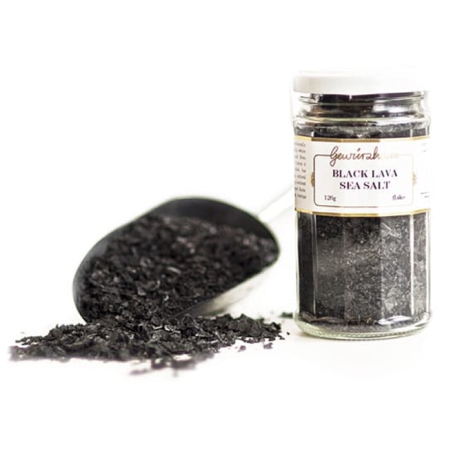 Pile Of Black Salt On Wooden Table Closeup View Pile Of Black Lava Salt On Wooden Table Closeup View