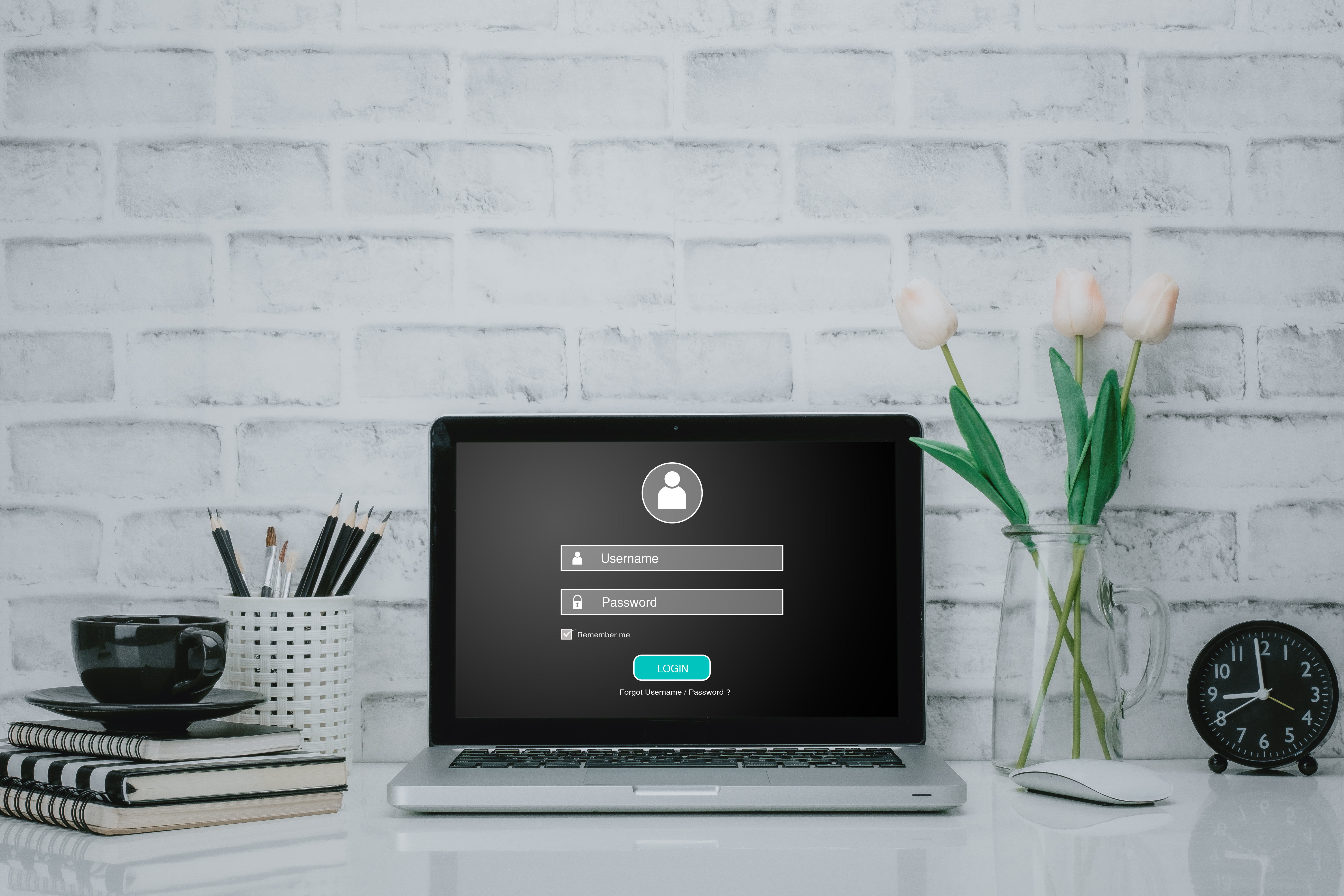 Employee laptop displaying a username and password login screen