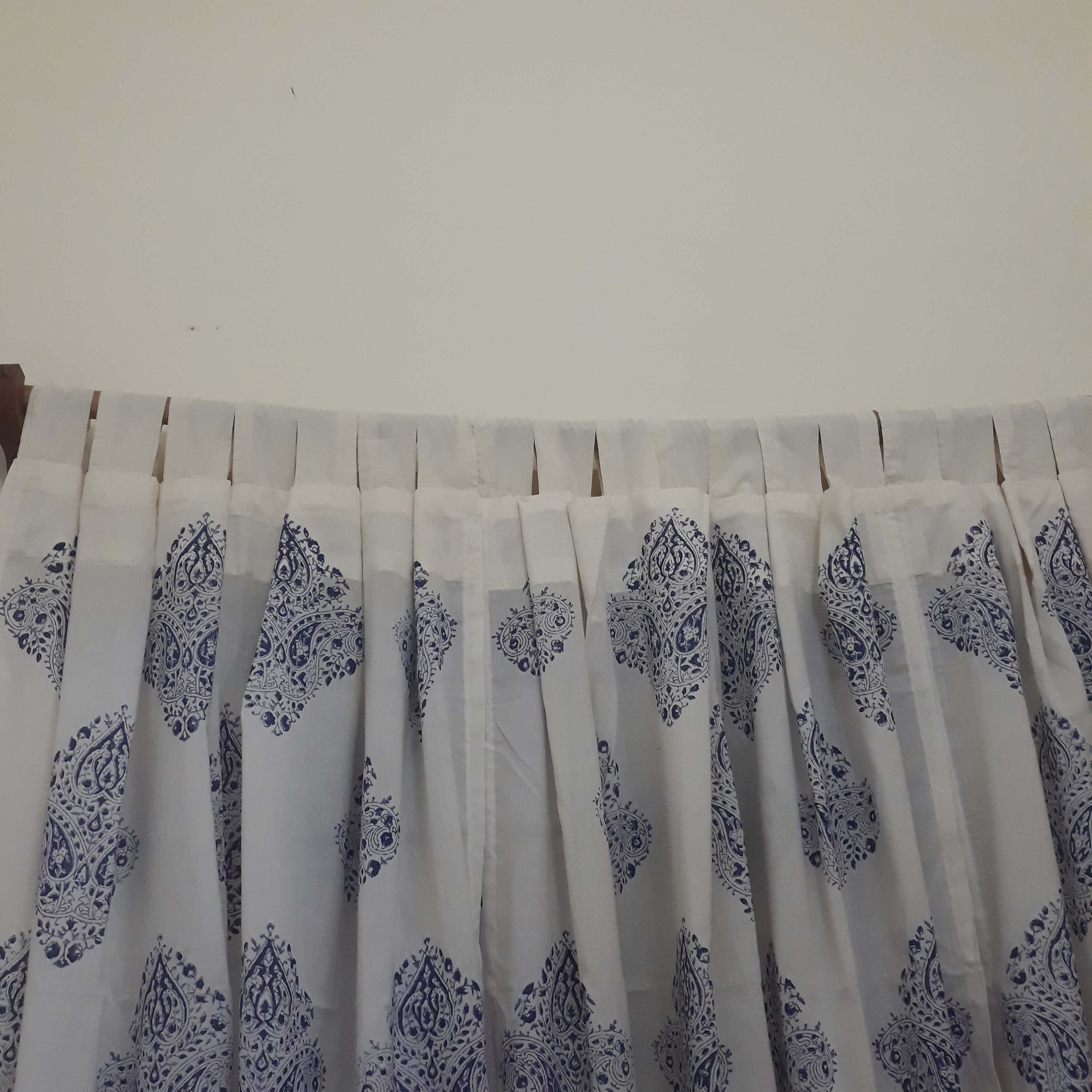 Loops tailored on an ethnic sheer decorative cotton window curtain