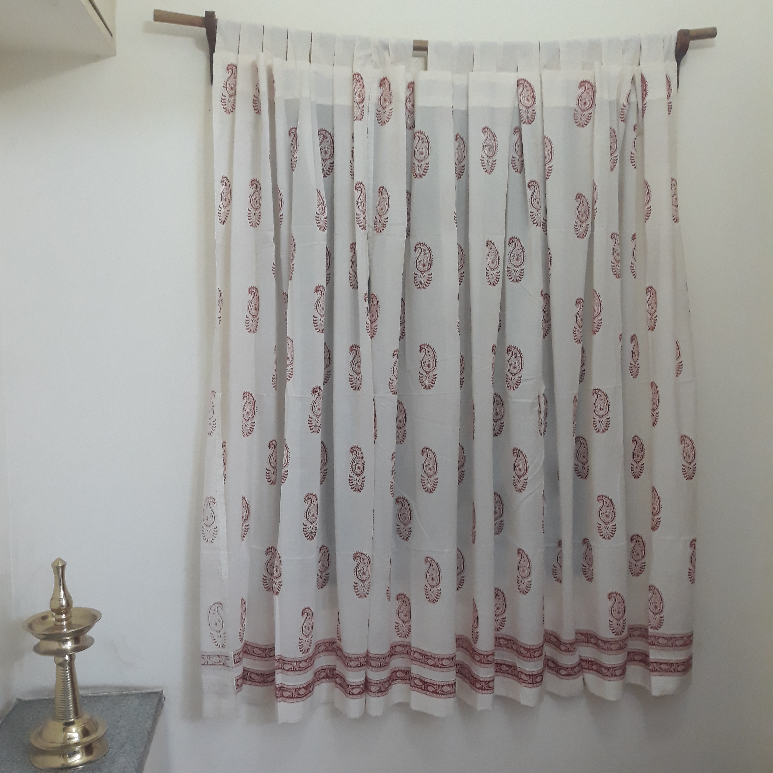 Sheer cotton window curtains block printed with red paisleys