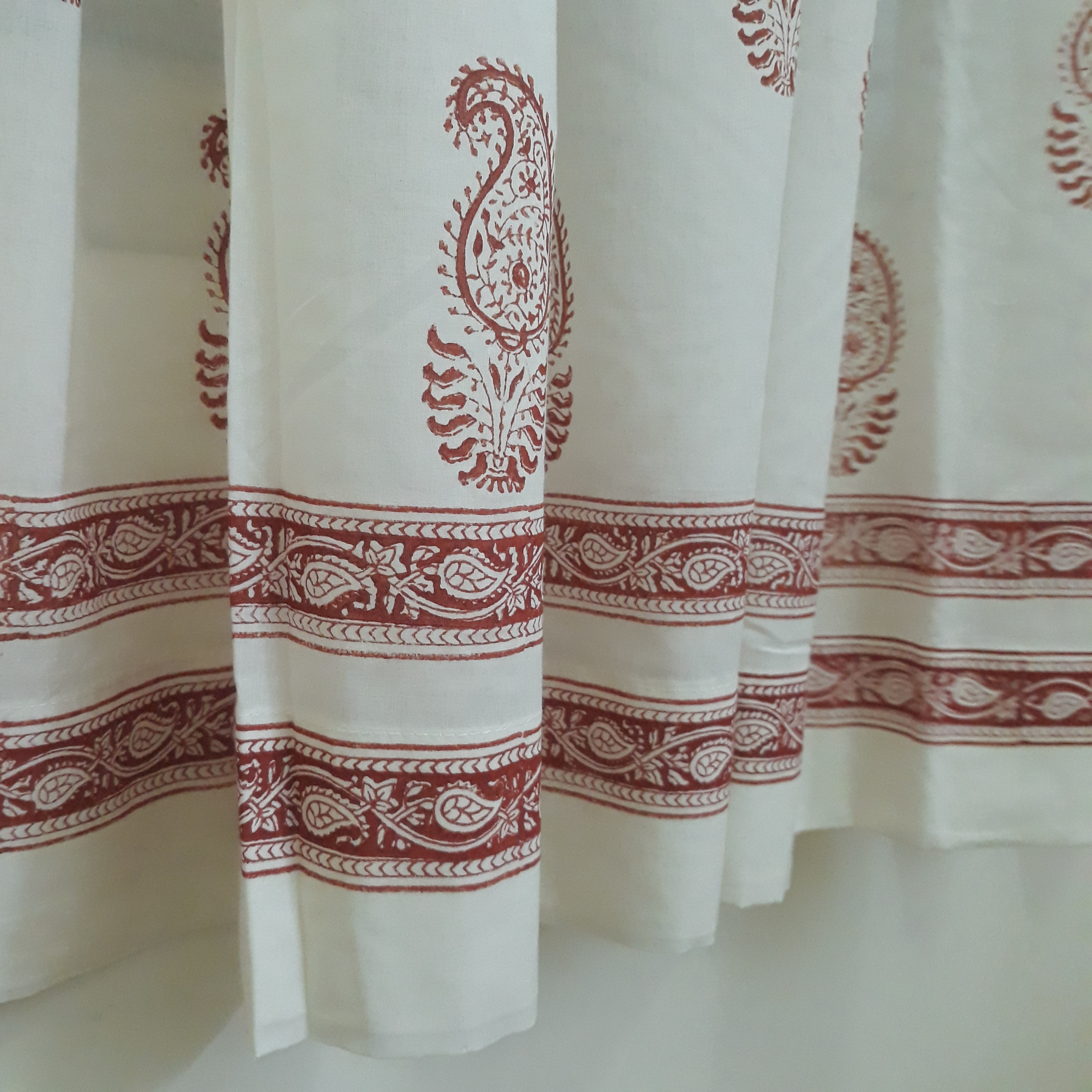 Block printed border on a sheer daylight cotton window curtain