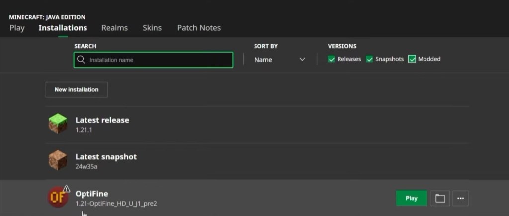 Minecraft Java Edition launcher showing the "Installations" tab with an OptiFine profile selected next to a green Play button.
