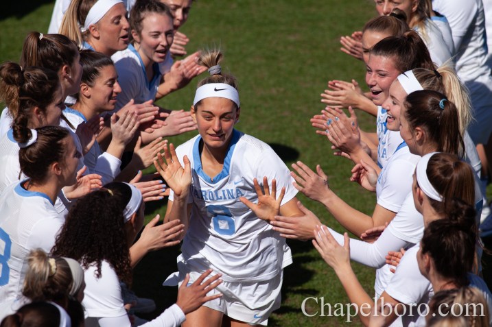 IMG_7544 Katie Hoeg (8) is introduced with the UNC starters as UNC women's lacrosse takes on Maryland at Dorrance Field in Chapel Hill on Saturday, February 22. (Dakota Moyer/Chapelboro.com)