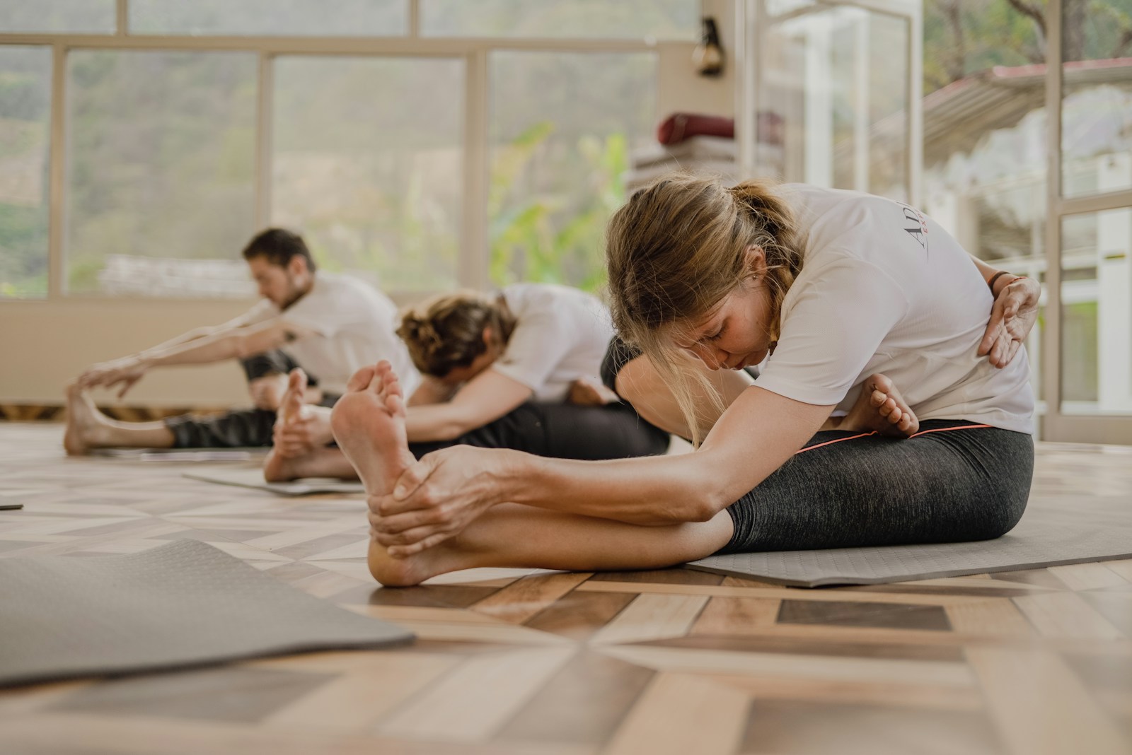 A group Pilates or mat class in a studio
