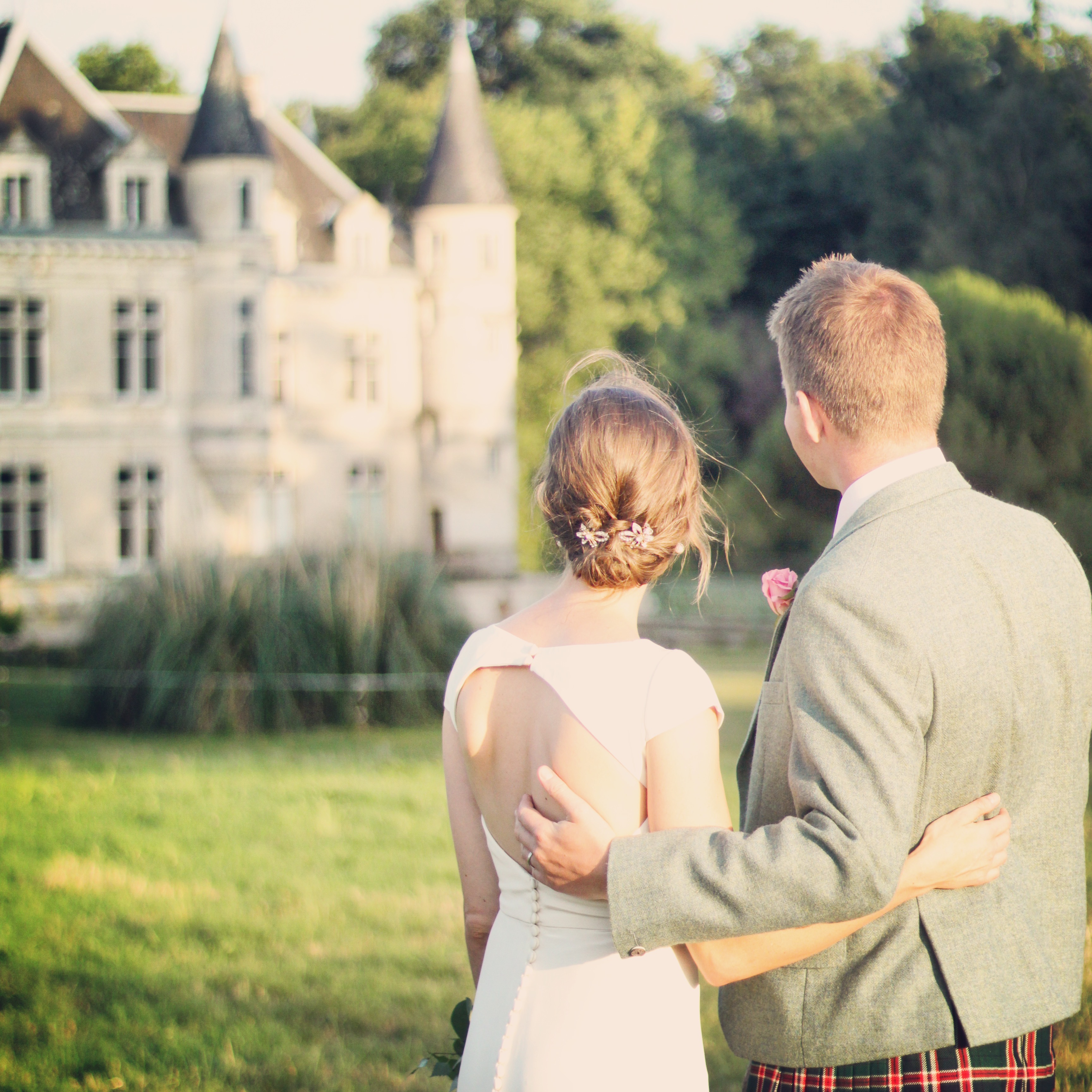couple looking at the turrets of castle