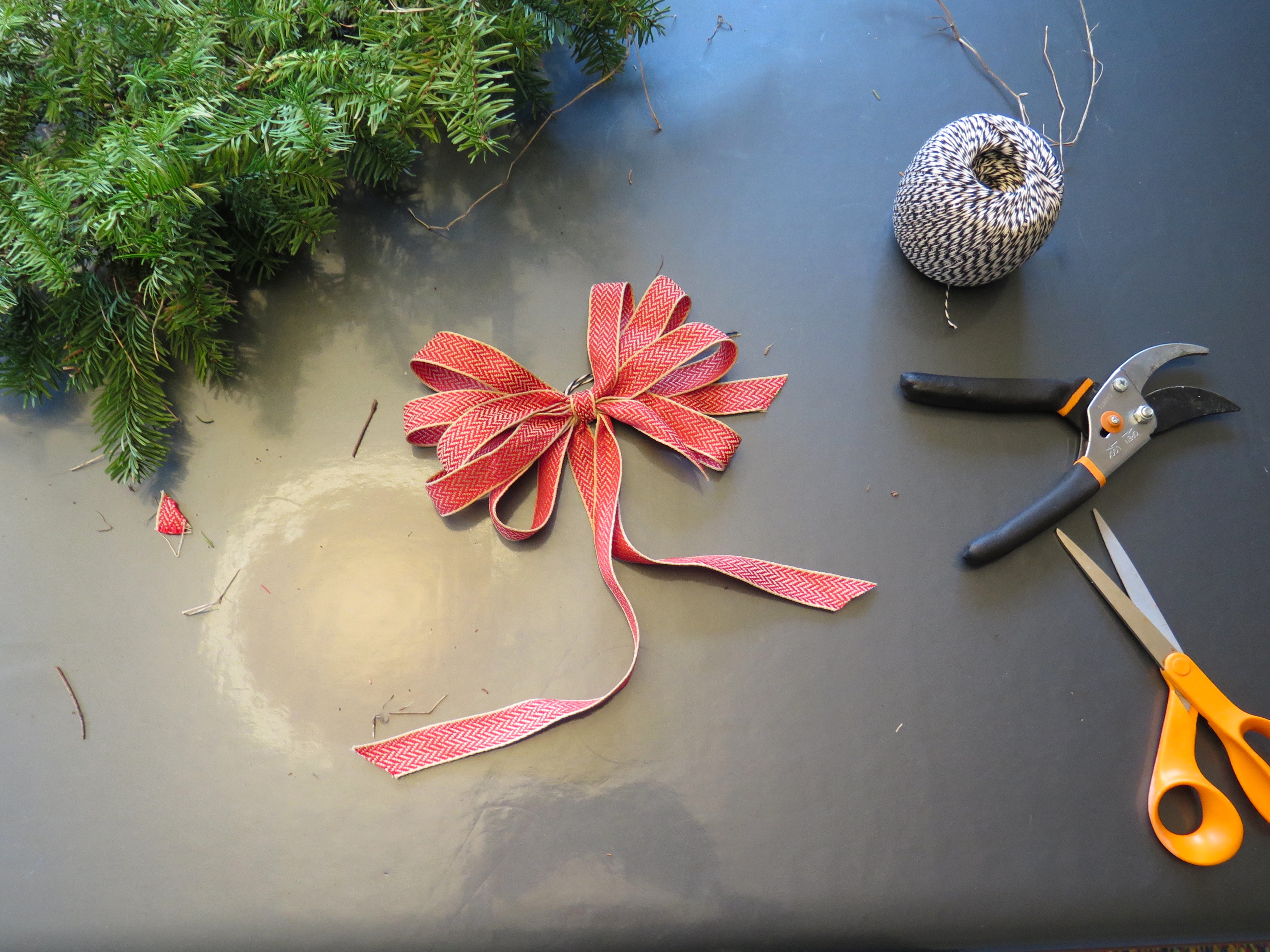 Picture shown the fanned out the loops of ribbon making a bow.