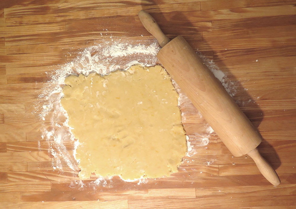 Roll out your cookie dough to a thickness of 1/4th inch.