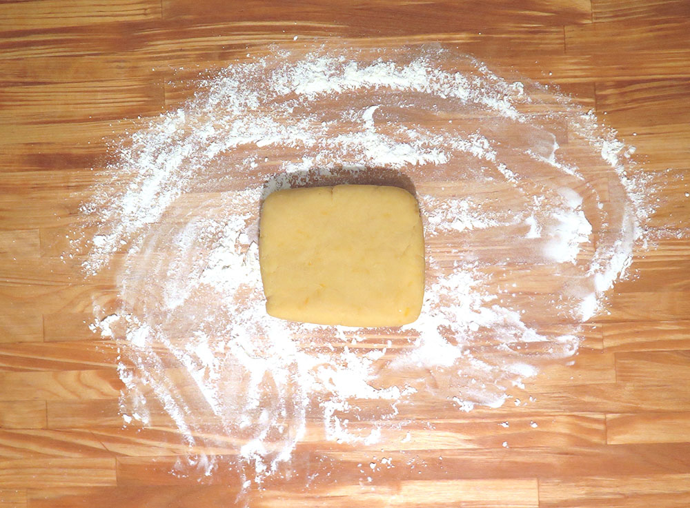 chilled dough on floured work surface.