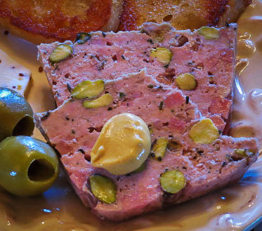 Country Terrine with Pistachios, at left, Game Terrine with Hazelnuts, on right