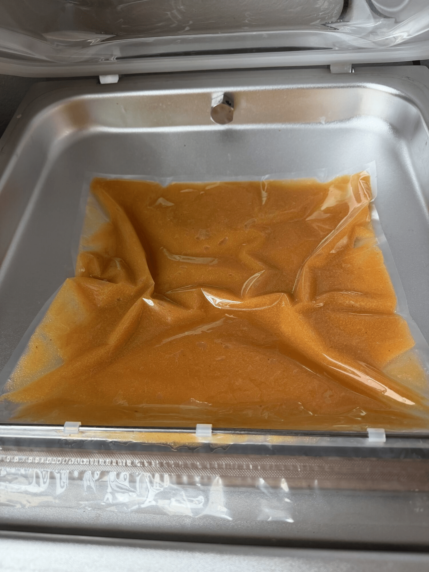 Peach sorbet base sealed flat in a vacuum bag.