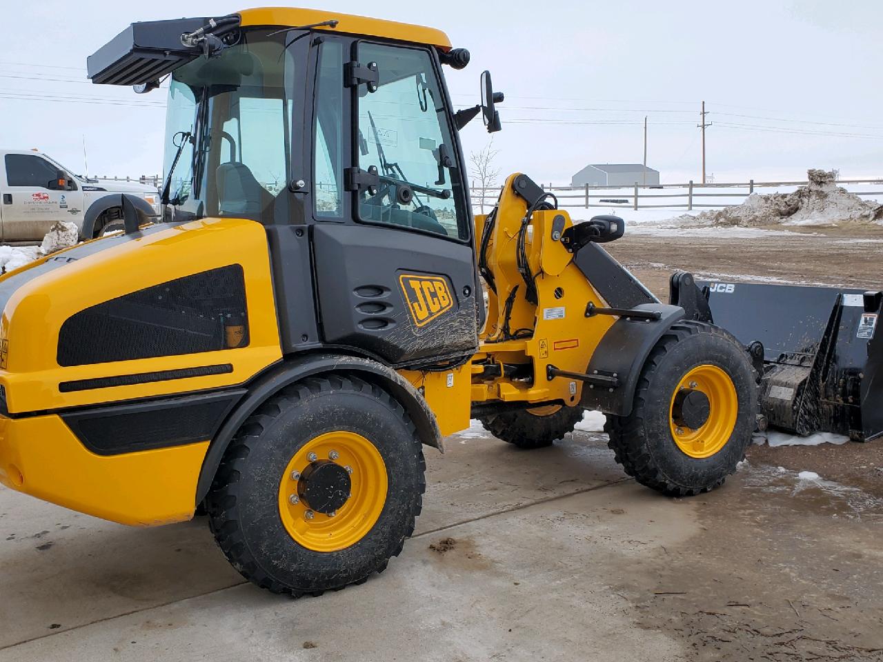 front end loader grading services www.cheyennehauling.com