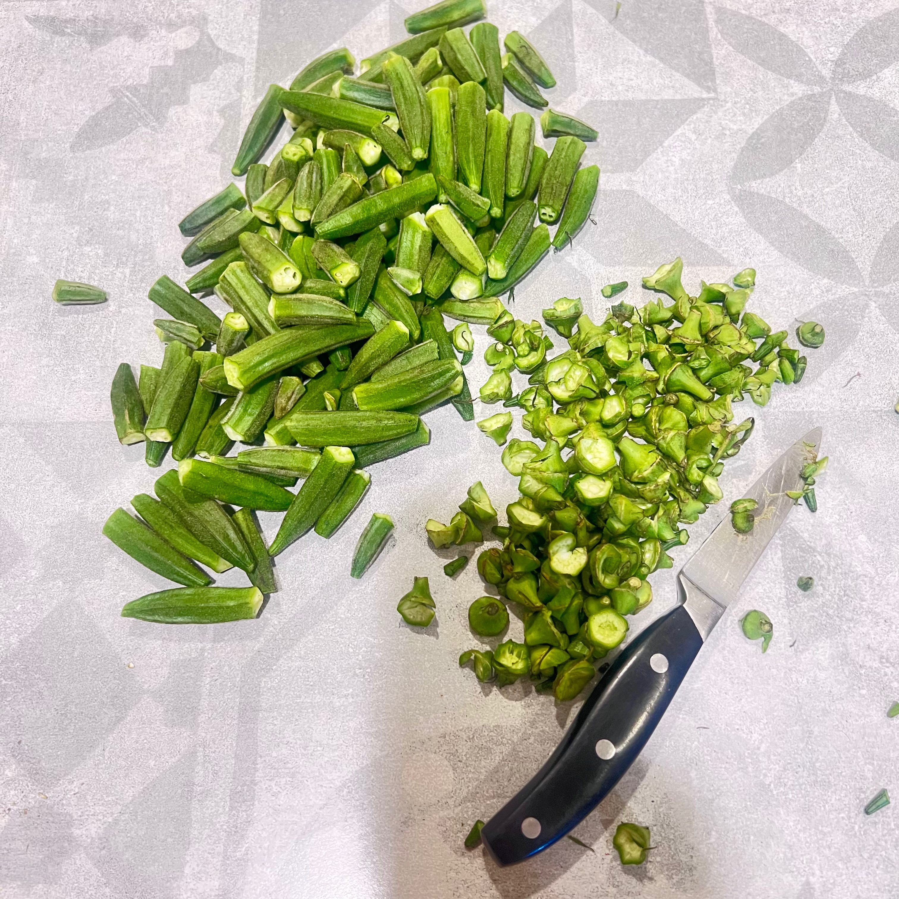 Cut the tips and ends of okra.