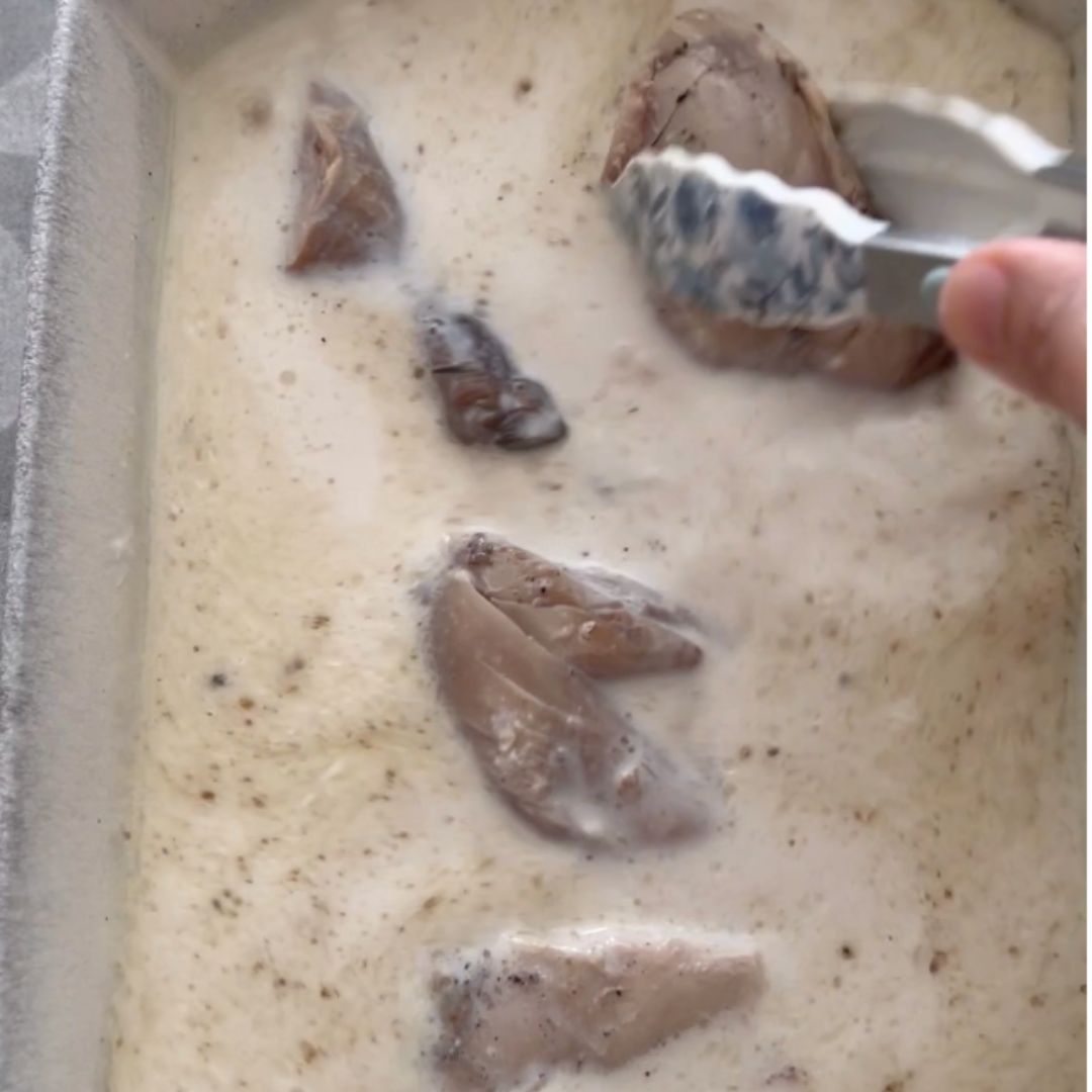 Arrange the pieces of chicken atop the rice.