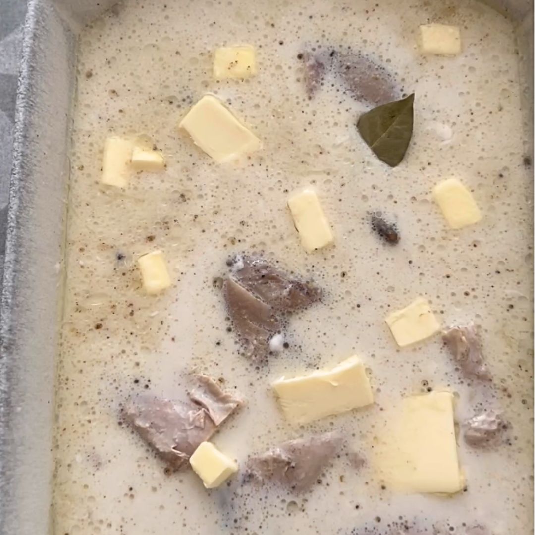 Scatter diced cold butter atop the rice.