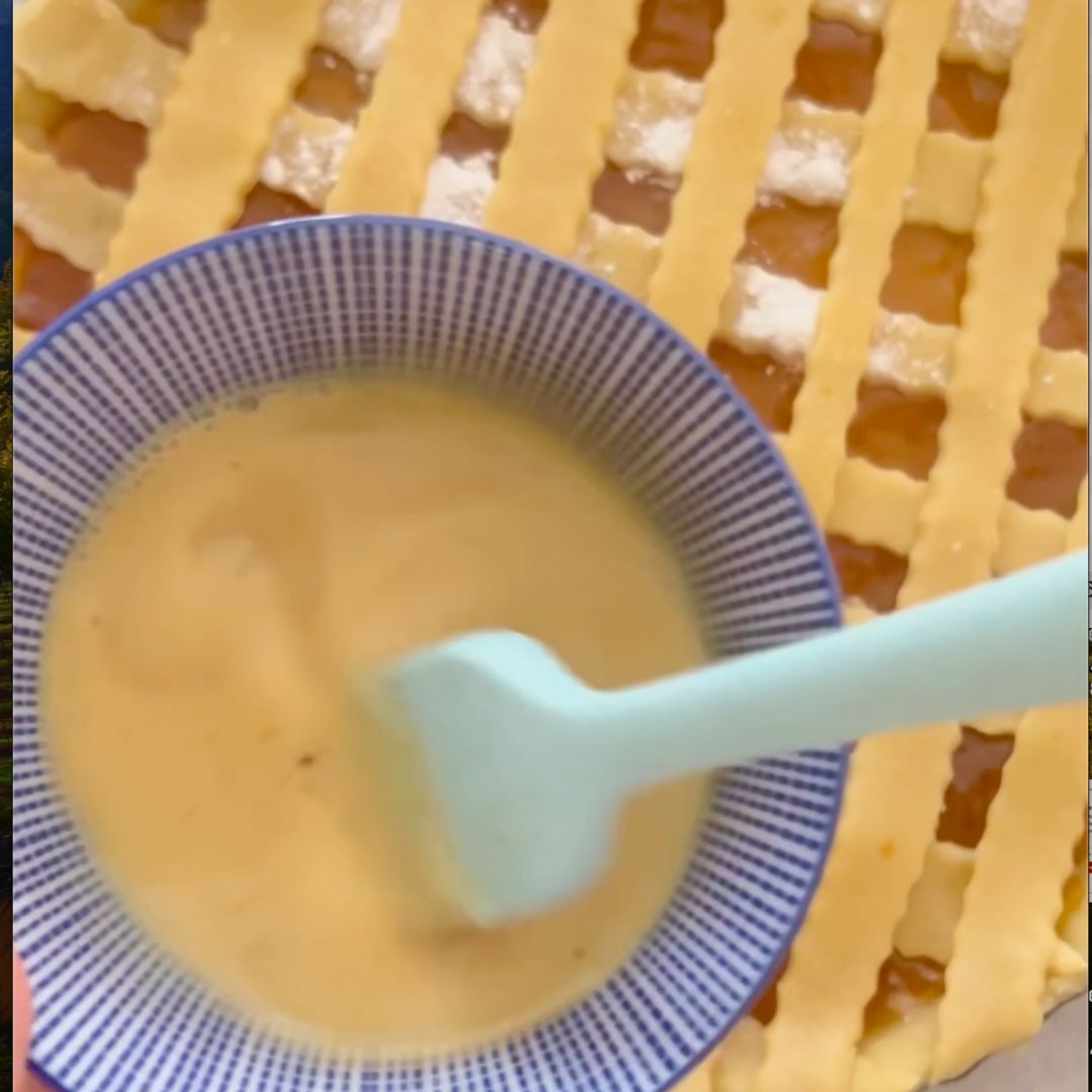 Brush the tart top with egg wash.