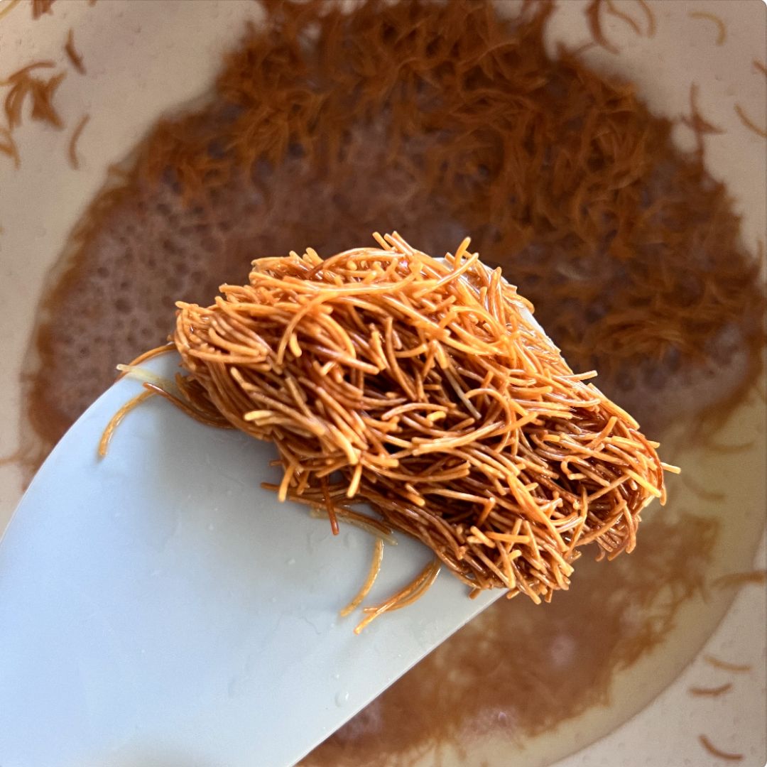 Fry vermicelli to a medium amber color.
