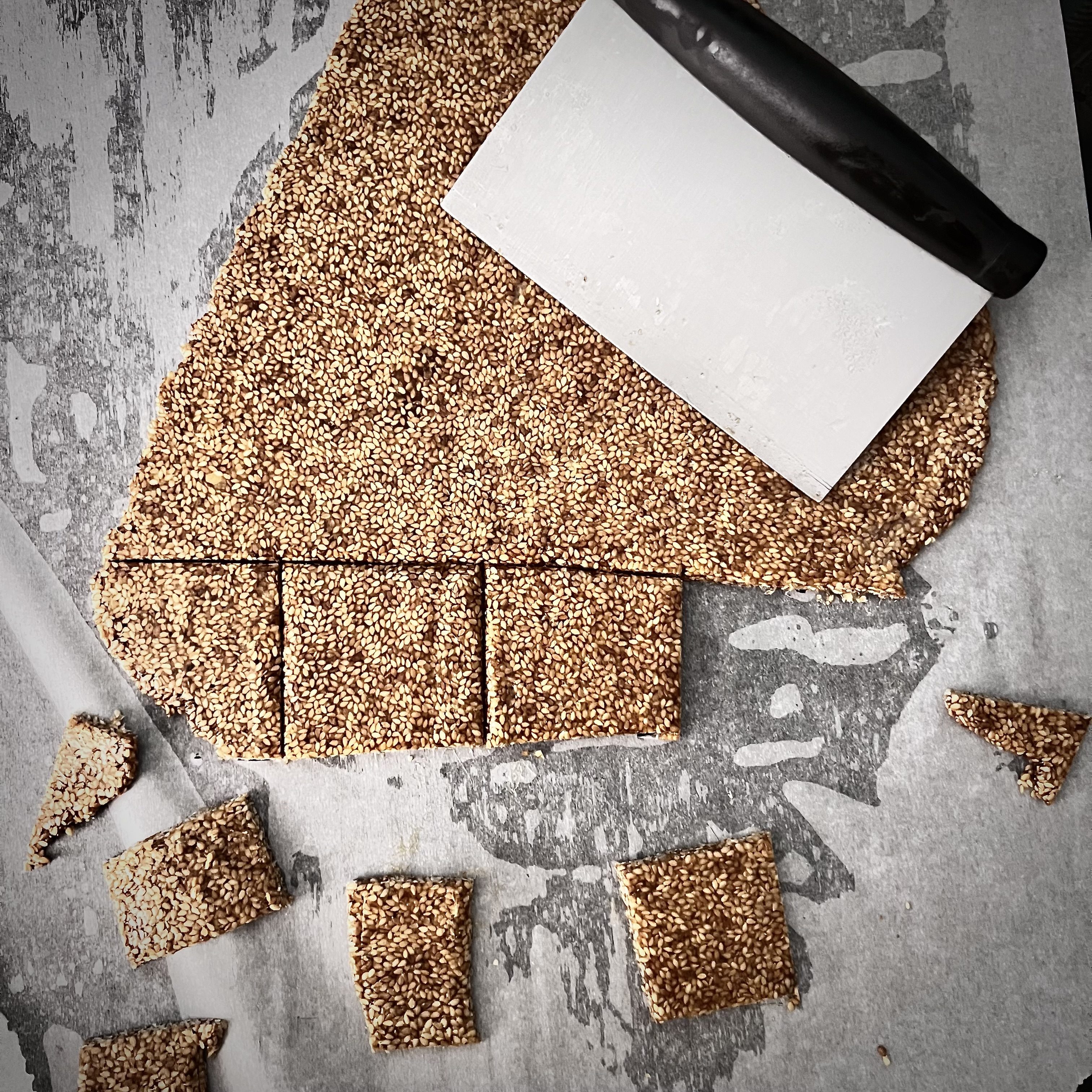 Using a dough knife cut to square.