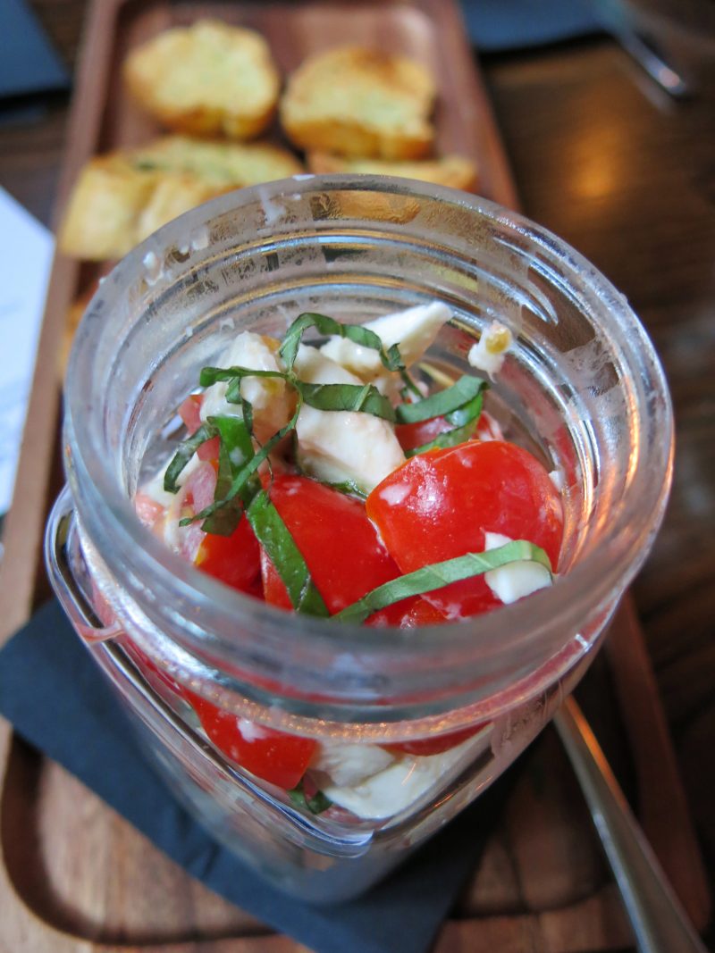 Gino's East Hosts Chicago Craft Beer Week Tap Takeover 7 Hand holding a mason jar Caprese