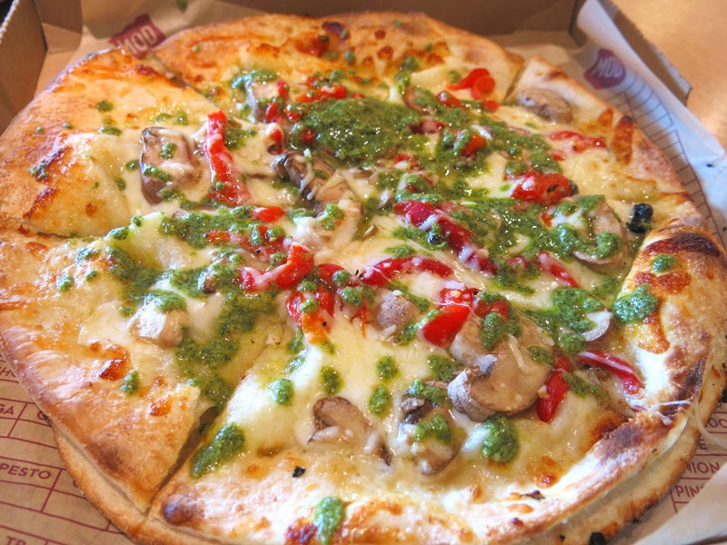 Tristan pizza slice showing rich colors and textures