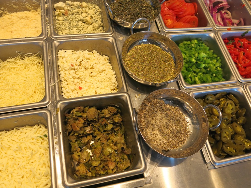 Close-up of various meat and vegetable toppings