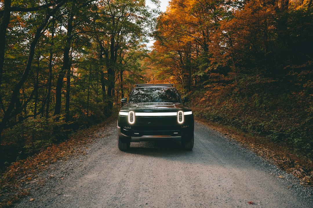 Archive Rivian R1T pickup photograph used as a brand illustration; the R2 SUV covered by this recall is not pictured